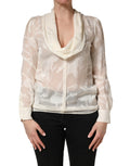 Blouse en soie semi-transparente blanche avec fleurs, Dolce & Gabbana, style élégant et féminin.
