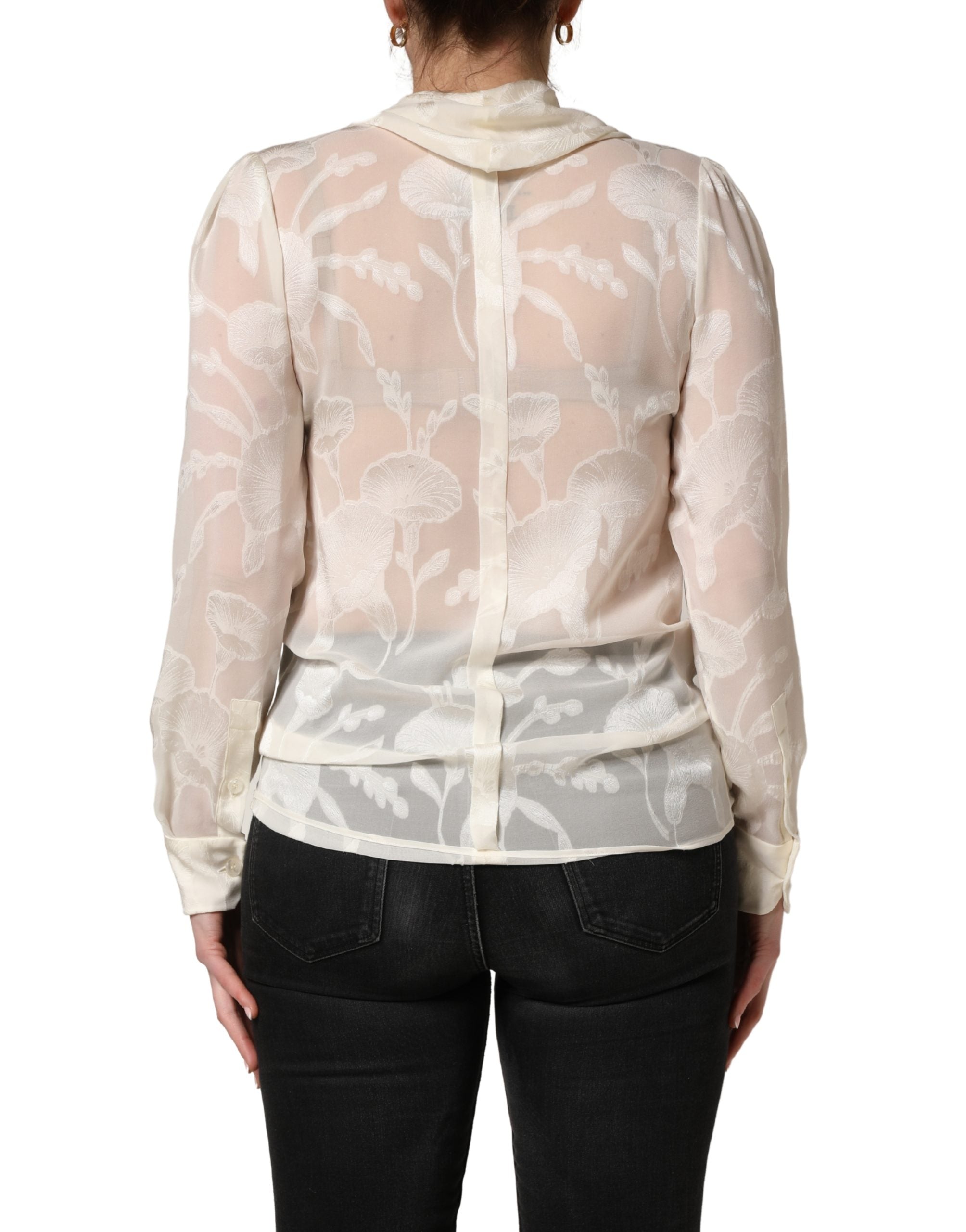 Blouse en soie semi-transparente blanche à fleurs Dolce & Gabbana, élégante et légère, pour un style sophistiqué.