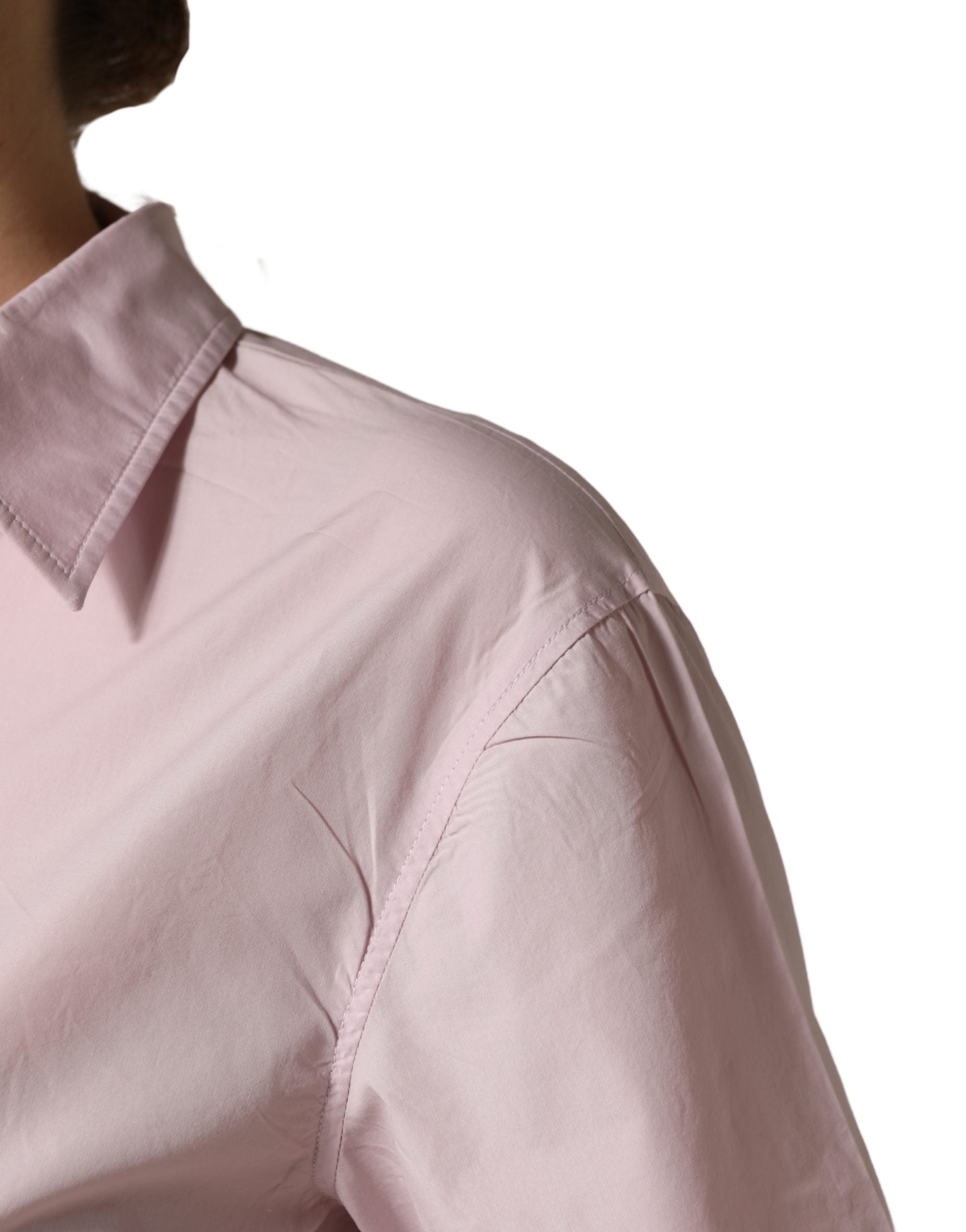 Chemisier Dolce & Gabbana LightPink en coton à col et boutons, élégant haut pour femme, détails visibles.