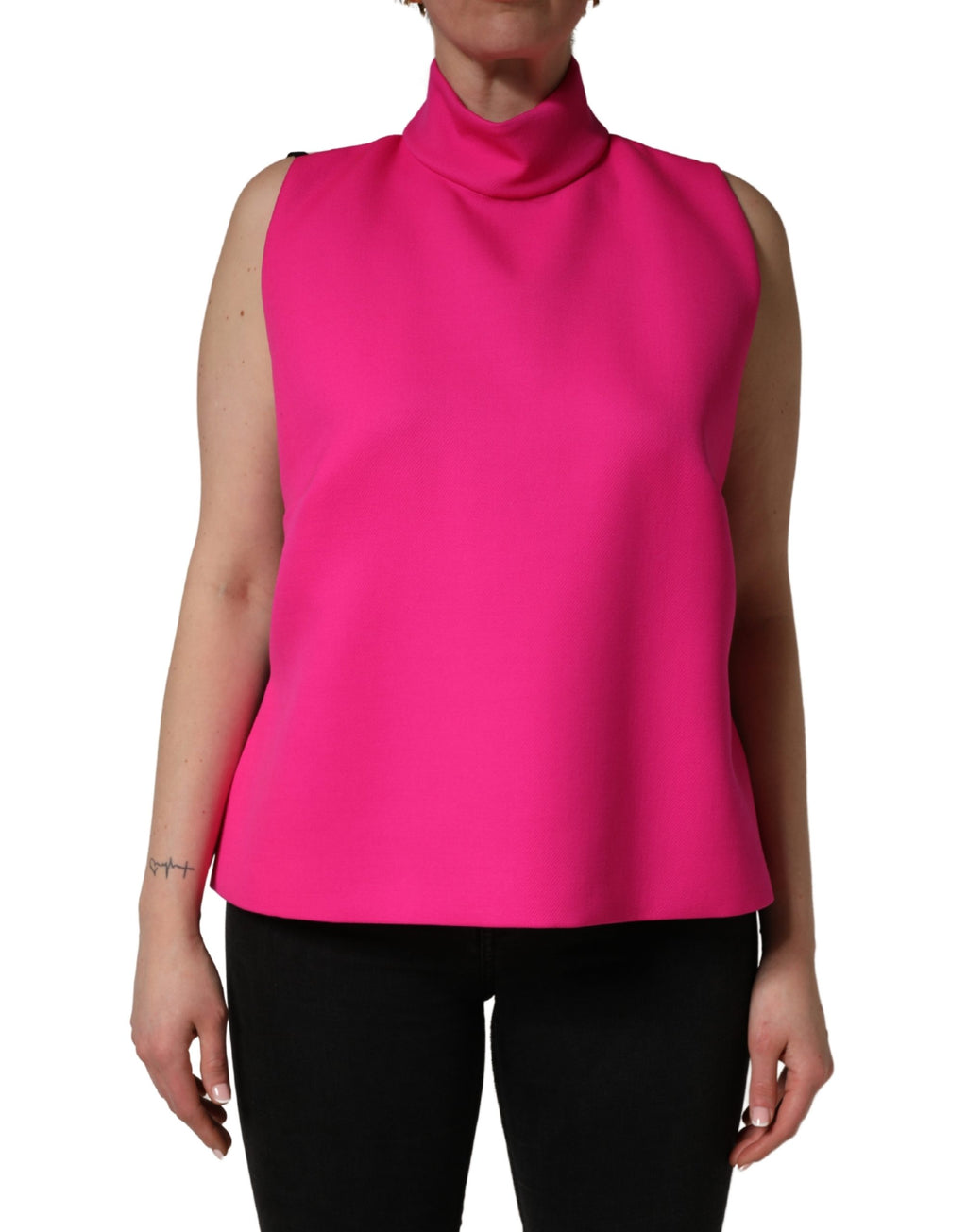 Débardeur sans manches rose vif en laine de Dolce & Gabbana, dos nu, mode élégante et tendance.