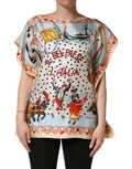 Top en soie Dolce & Gabbana multicolore avec scènes d'Italie, motif graphique et détails colorés.