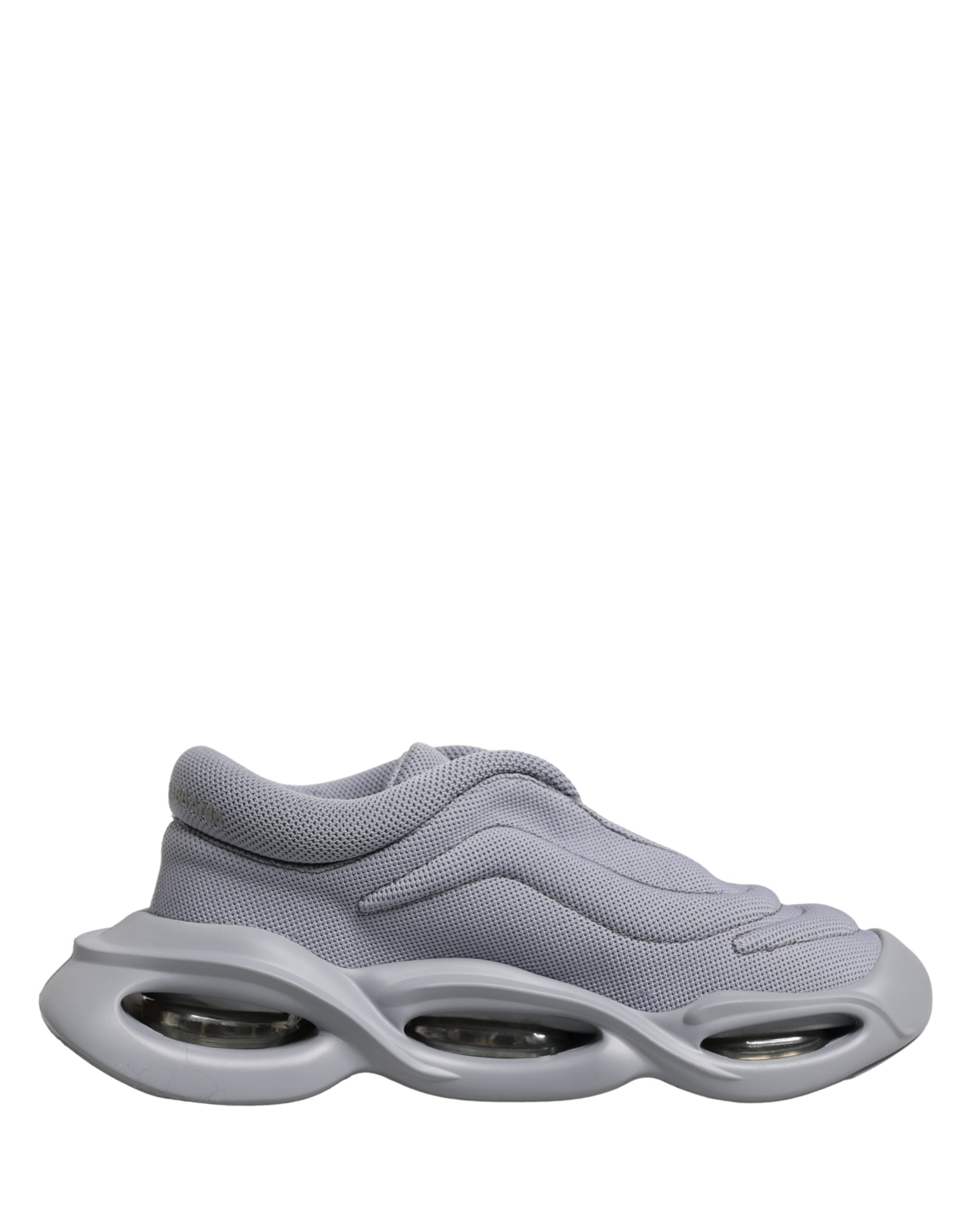 Chaussures sneakers slip-on Dolce & Gabbana gris à vague, basse, pour homme, en toile avec semelle blanche.
