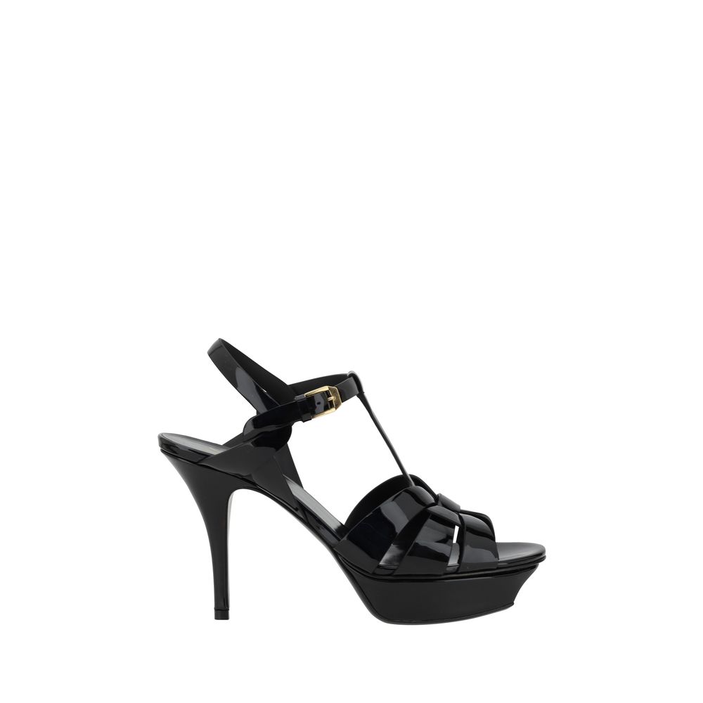 Sandales Saint Laurent en cuir de veau noir Bos Taurus avec talons stilettos élégants et fines.