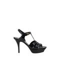 Sandales Saint Laurent en cuir de veau noir Bos Taurus avec talons stilettos élégants et fines.