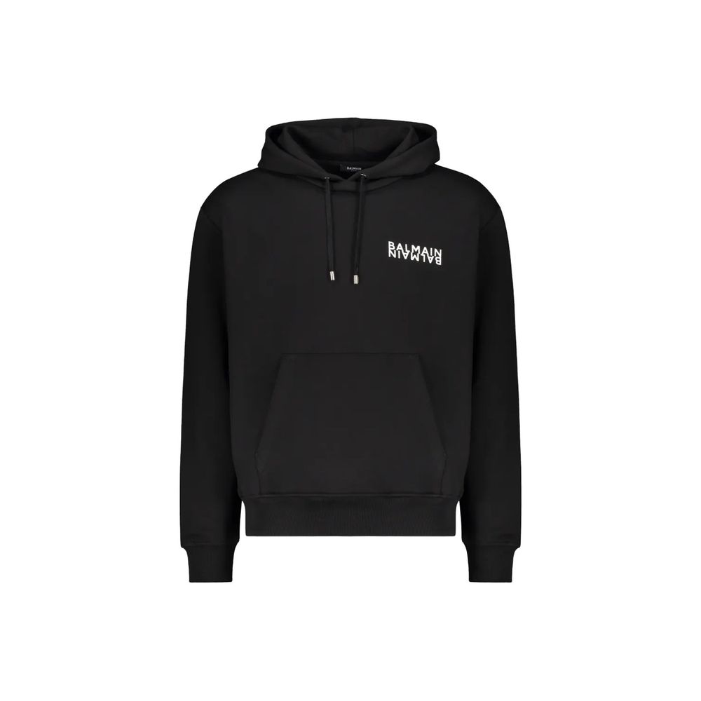 Sweat à capuche noir en coton de Balmain, confortable et tendance, avec logo Balmain visible sur le devant.
