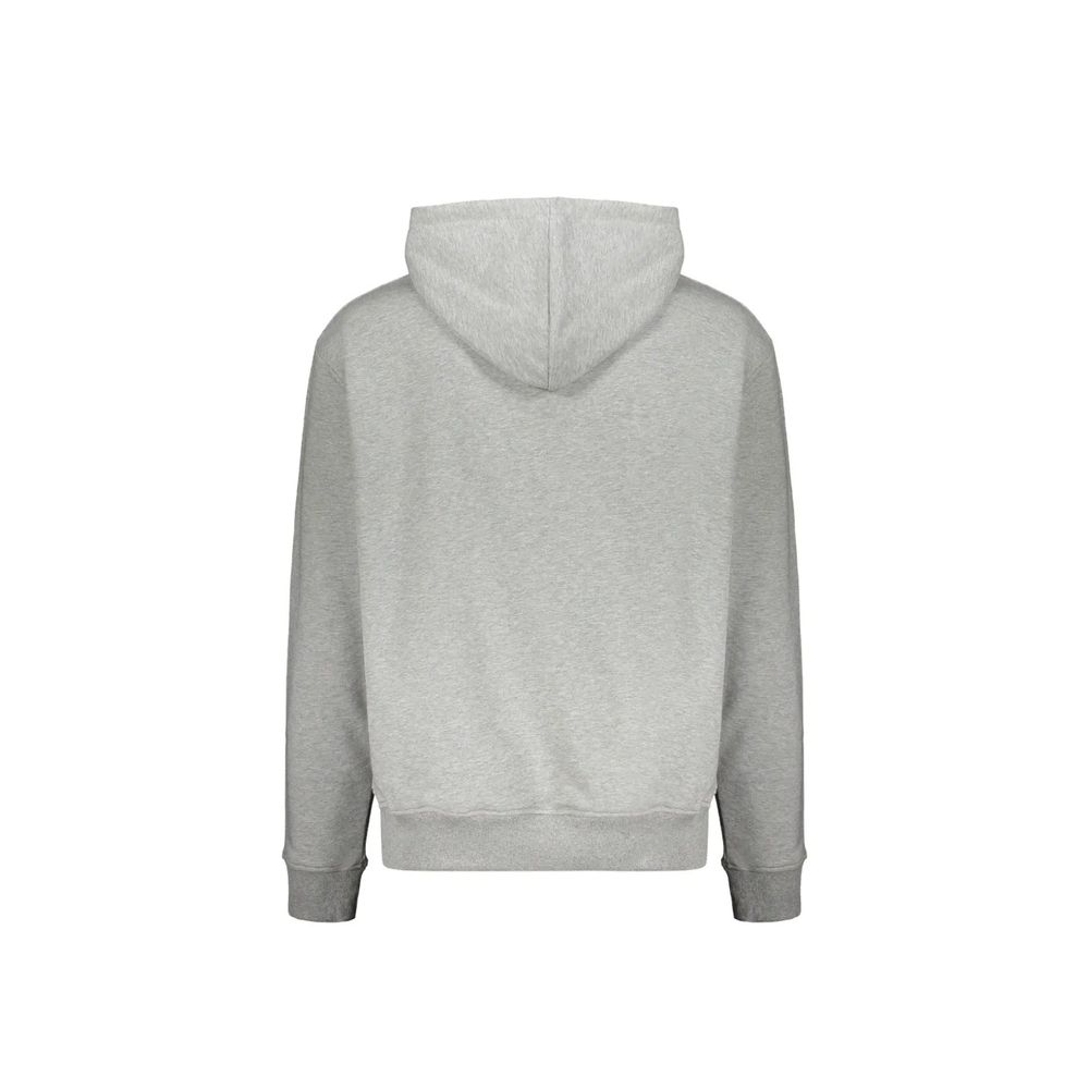 Sweat à capuche gris en coton de la marque Balmain, détail du tissu et du design moderne.