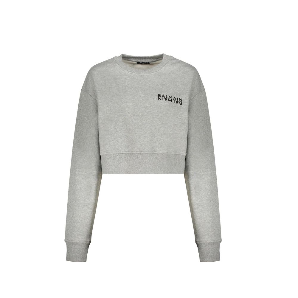 Sweatshirt gris en coton de Balmain avec logo brodé, vue de face, style décontracté et moderne.