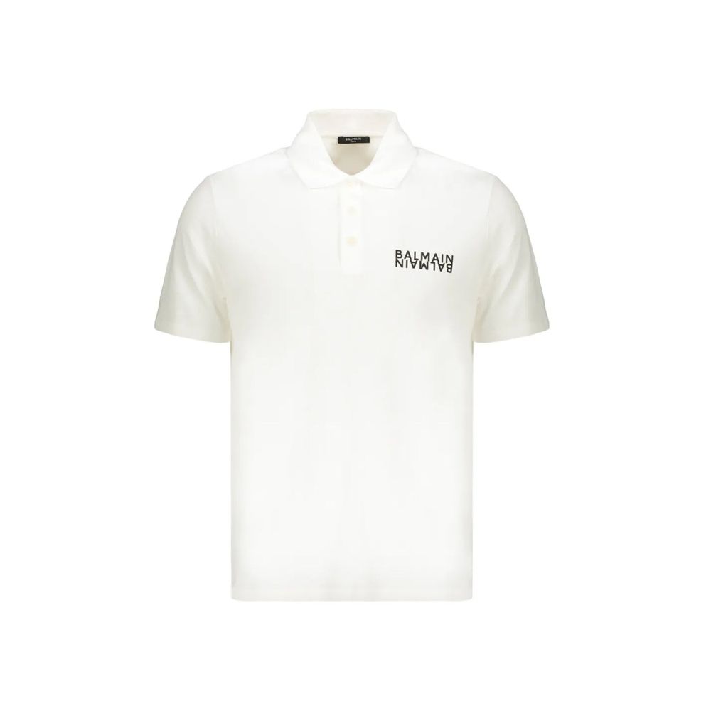 Chemise polo blanche en coton de la marque Balmain, avec col classique et logo discret sur la poitrine.