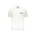 Chemise polo blanche en coton de la marque Balmain, avec col classique et logo discret sur la poitrine.