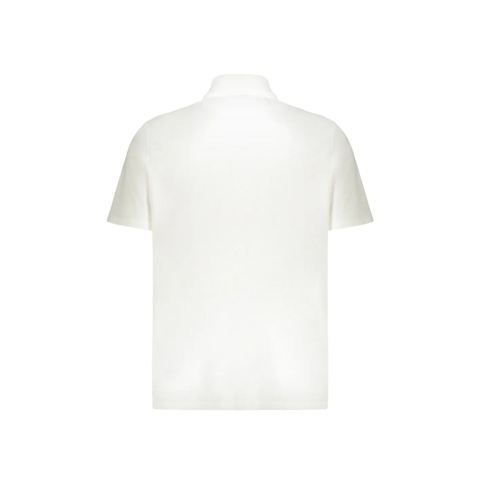 Chemise polo blanche en coton de la marque Balmain, avec col classique et logo discret sur la poitrine.