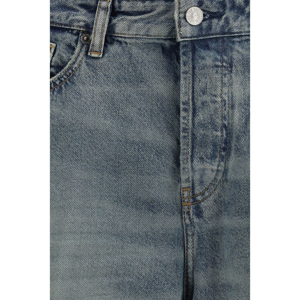 Jeans Diesel en coton bleu à coupe décontractée, vue frontale, montrant la texture et la coupe relaxée du pantalon.