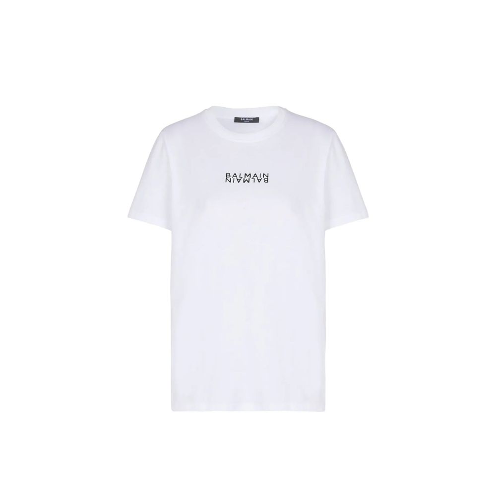 T-shirt blanc en coton de la marque Balmain, design simple et élégant, porté sur un mannequin.