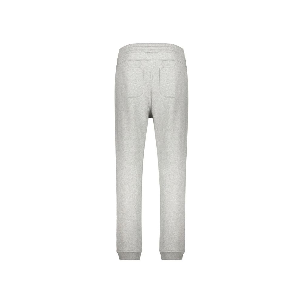 Pantalons de jogging gris en coton de Balmain, vêtements de sport confortables avec logo discret, visibles sur le modèle.