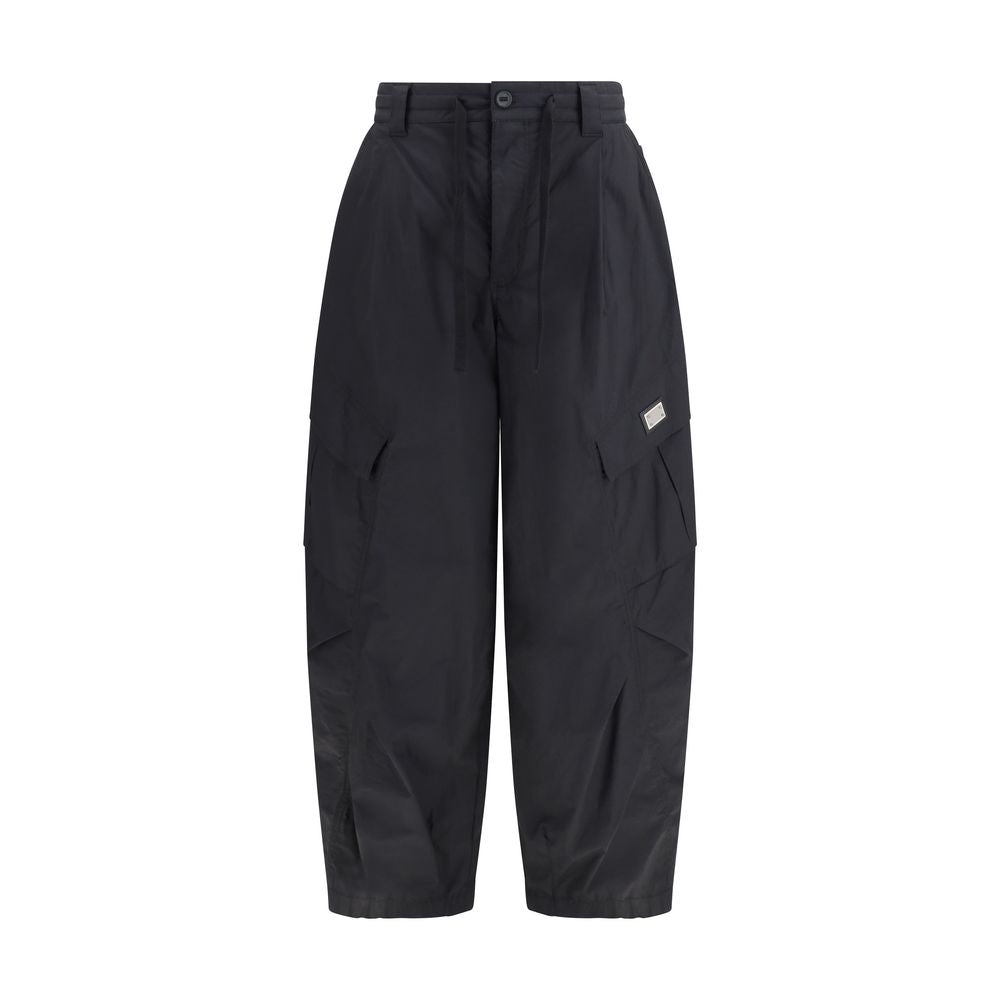 Pantalons cargo en coton noir de Dolce & Gabbana, style décontracté, avec plusieurs poches et détails modernes, vue de face.