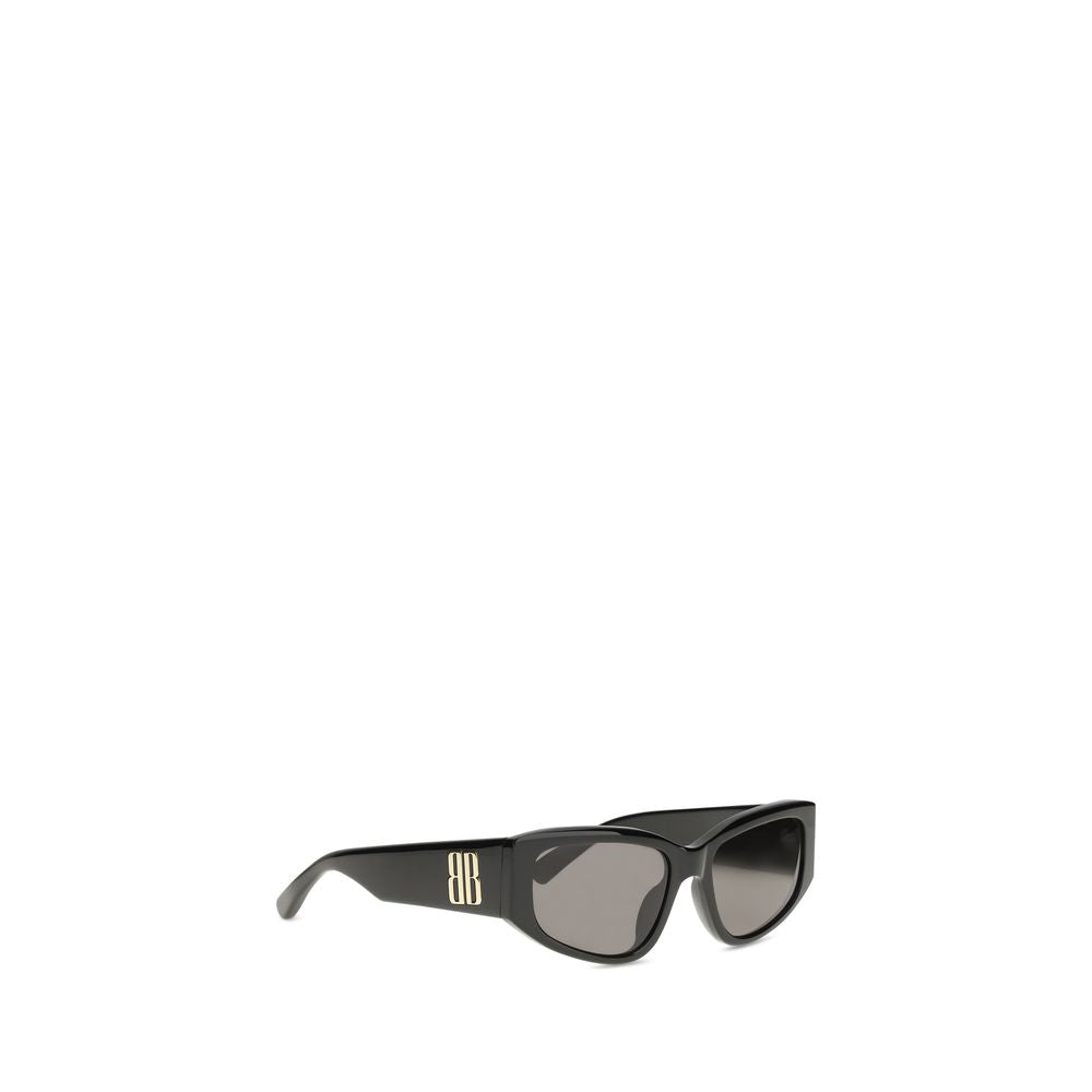 Lunettes de soleil noires Balenciaga en acétate avec monture épaisse et design moderne visibles sur l'image.