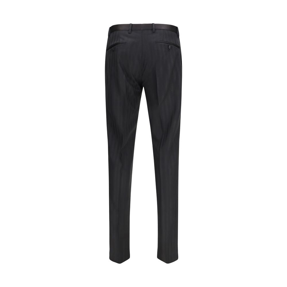 Pantalon de costume en laine noire Dolce & Gabbana Oves Aries pour femme, coupe élégante et tissu de qualité.