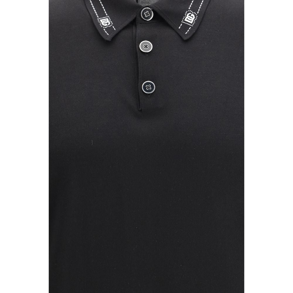 Chemise polo en soie noire de Dolce & Gabbana, veste élégante avec col classique et fini soigné.