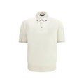 Chemise polo en soie beige de Dolce & Gabbana, veste élégante pour homme avec col et boutons visibles.