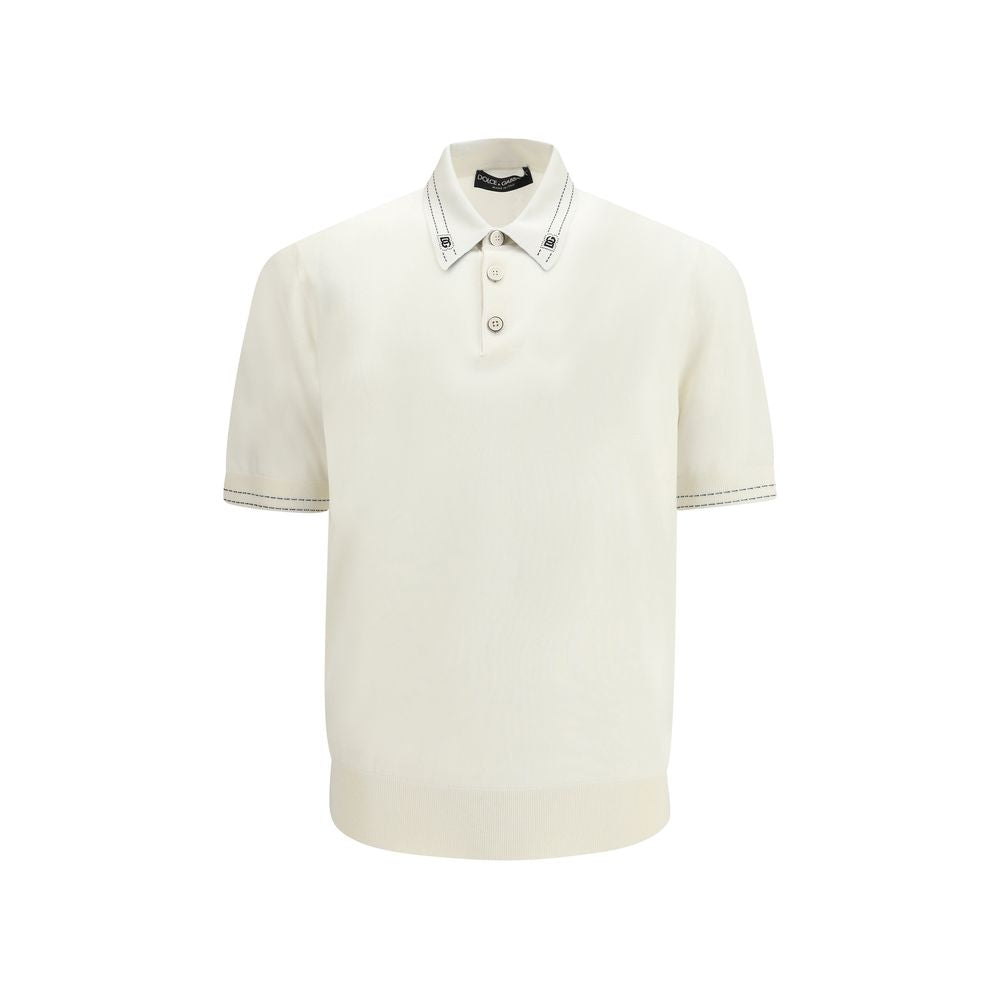 Chemise polo en soie beige de Dolce & Gabbana, veste élégante pour homme avec col et boutons visibles.