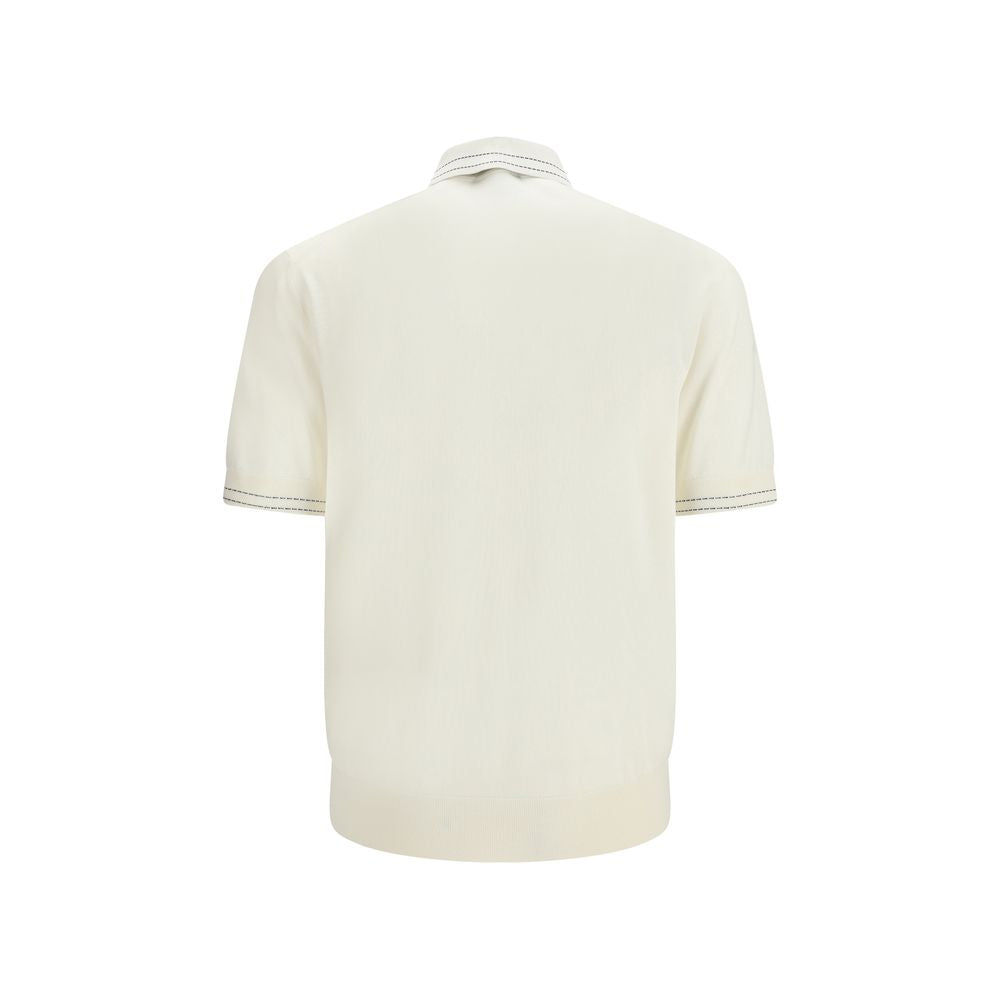 Chemise polo en soie beige de Dolce & Gabbana, vue de face sur un mannequin.