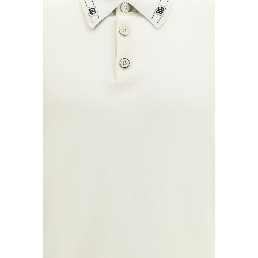 Chemise polo en soie beige de Dolce & Gabbana, élégante et sophistiquée, vue de face sur un mannequin.