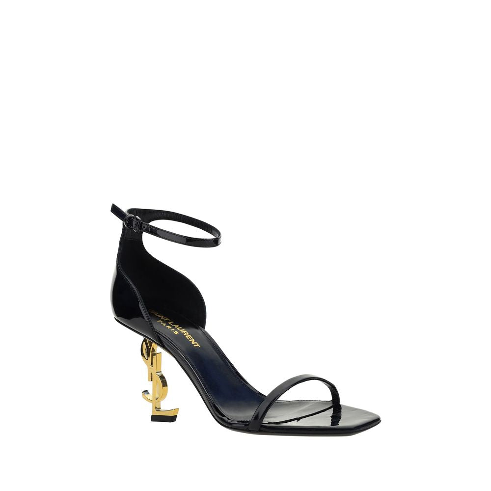 Sandales plateformes en cuir de veau noir Saint Laurent Bos Taurus, avec semelle épaisse et design élégant.