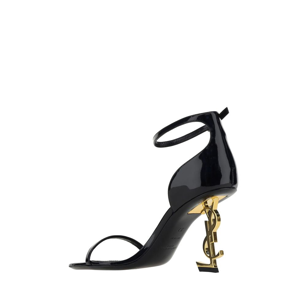 Sandales plateforme en cuir de veau noir Saint Laurent Bos Taurus, avec semelle épaisse et design élégant.
