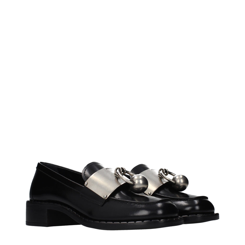 Mocassins en cuir noir Prada pour homme, style slip-on, avec finition élégante et semelle en caoutchouc.