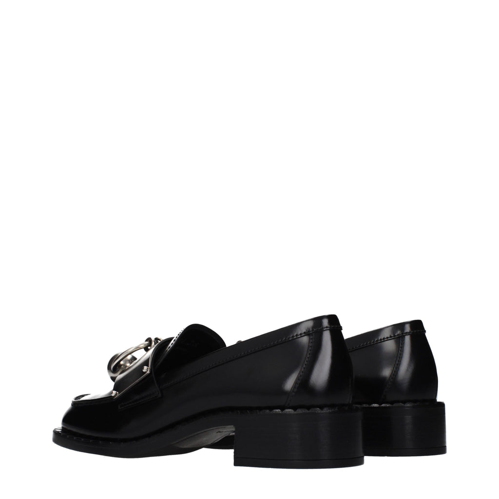 Mocassins en cuir noir Prada pour hommes, chaussons slip-on élégants et confortables, avec finition lisse et semelle en caoutchouc.