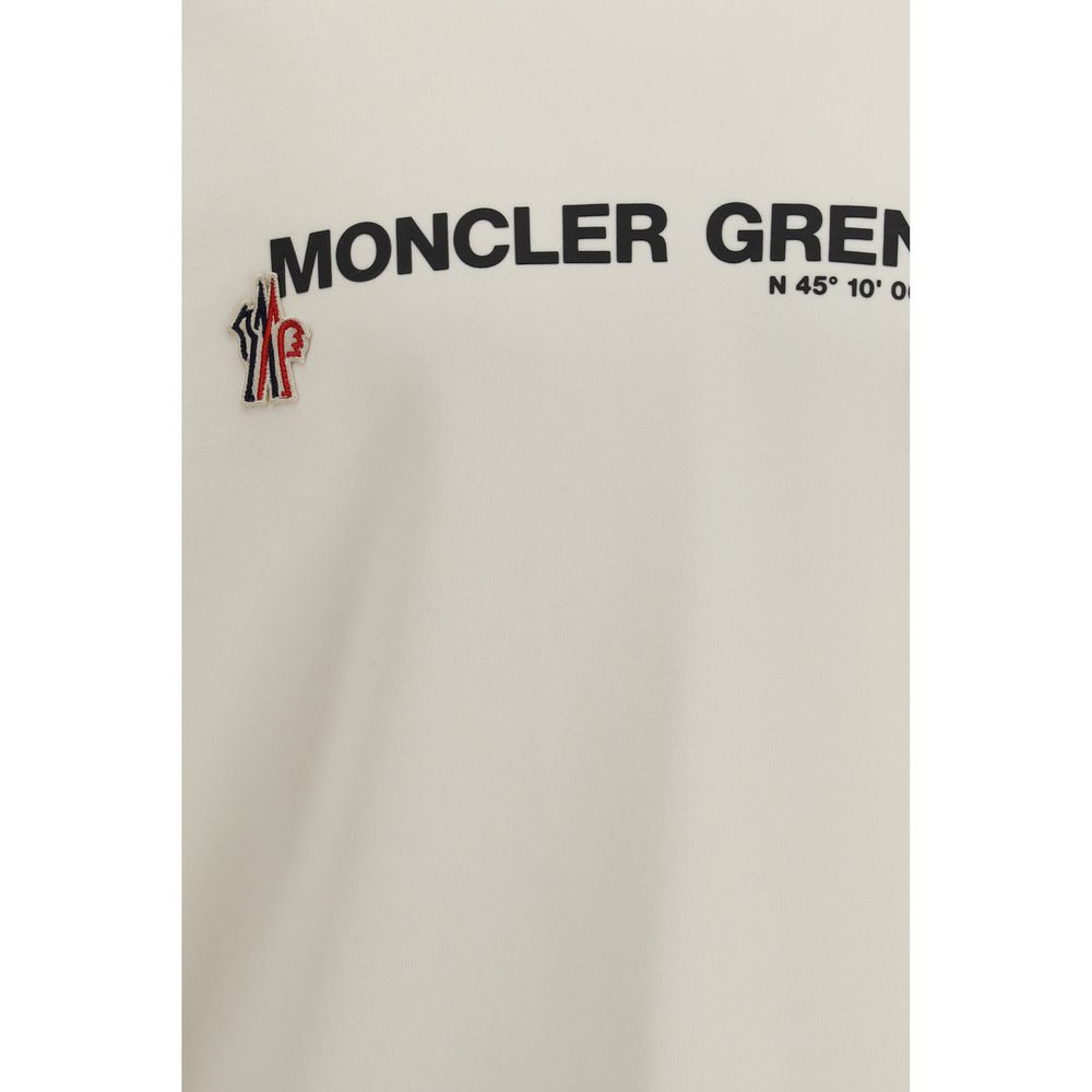 Sweat-shirt en coton beige Moncler Grenoble, coupe décontractée, avec logo brodé sur la poitrine, pour homme ou femme.