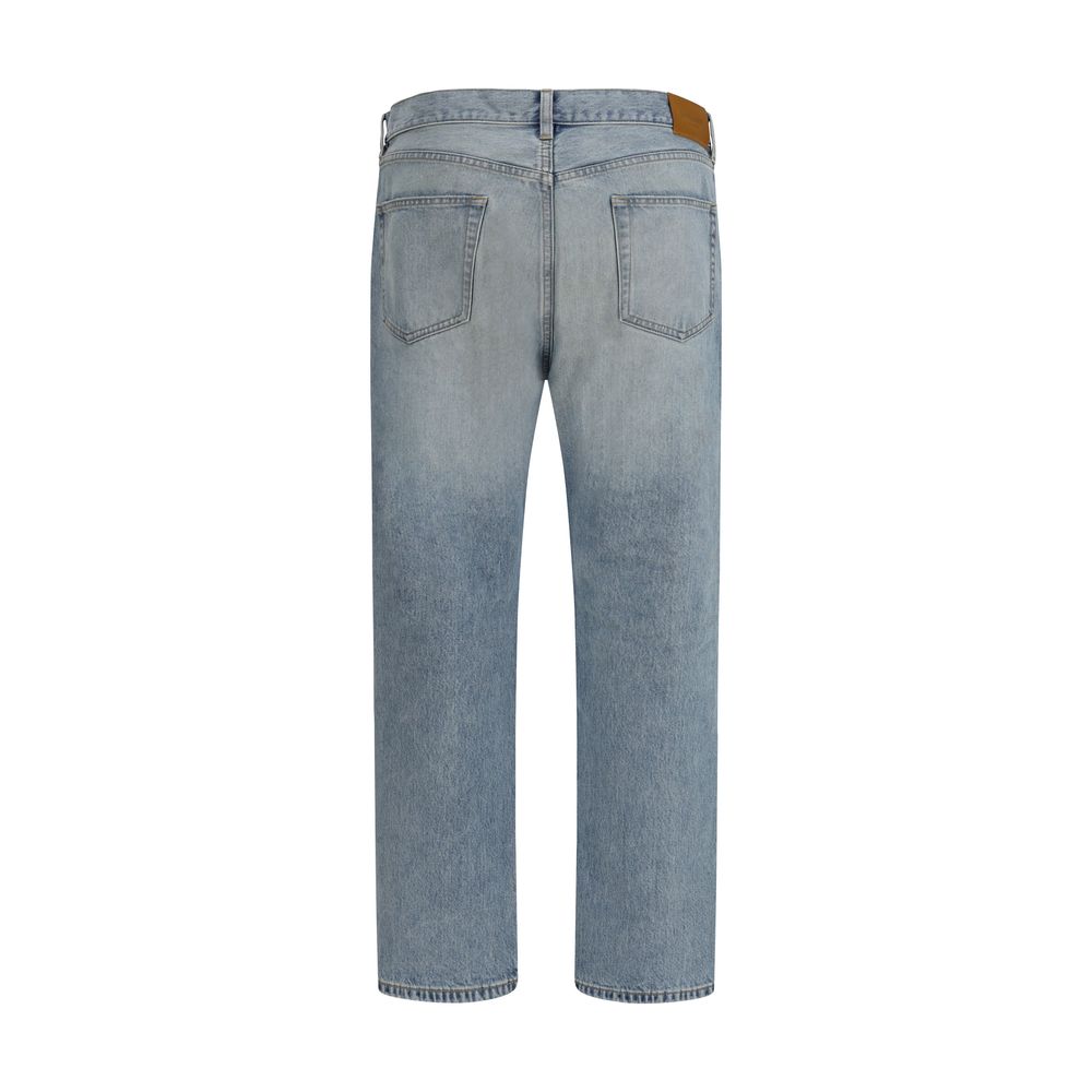 Jeans droits en coton bleu de Saint Laurent, style classique et coupe droite, visibles sur un mannequin.