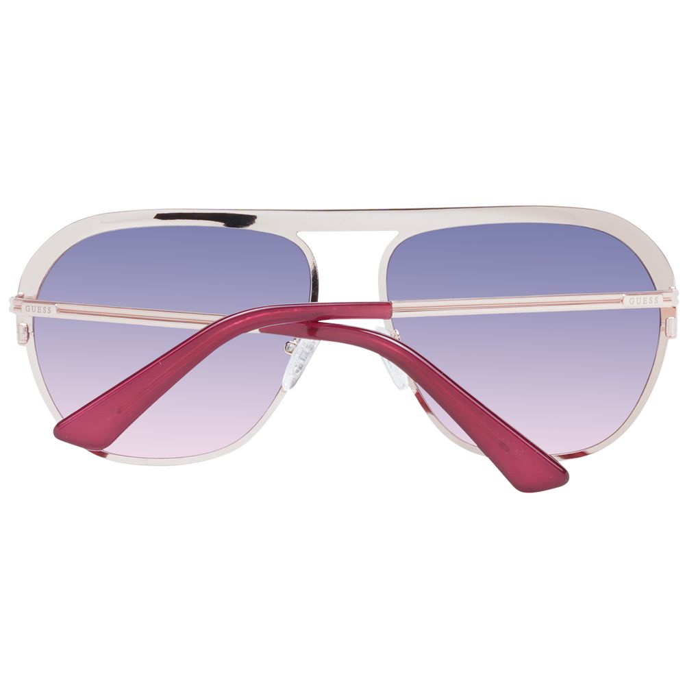 Lunettes de soleil en métal rose or de la marque Guess, avec monture élégante et design moderne.