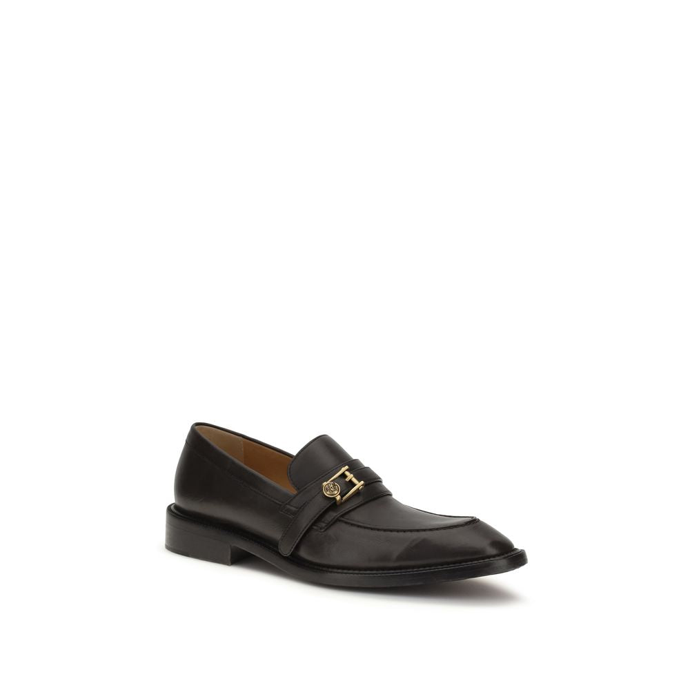 Chaussures mocassins slip-on en cuir de veau noir de Versace Bos Taurus, style élégant pour homme.
