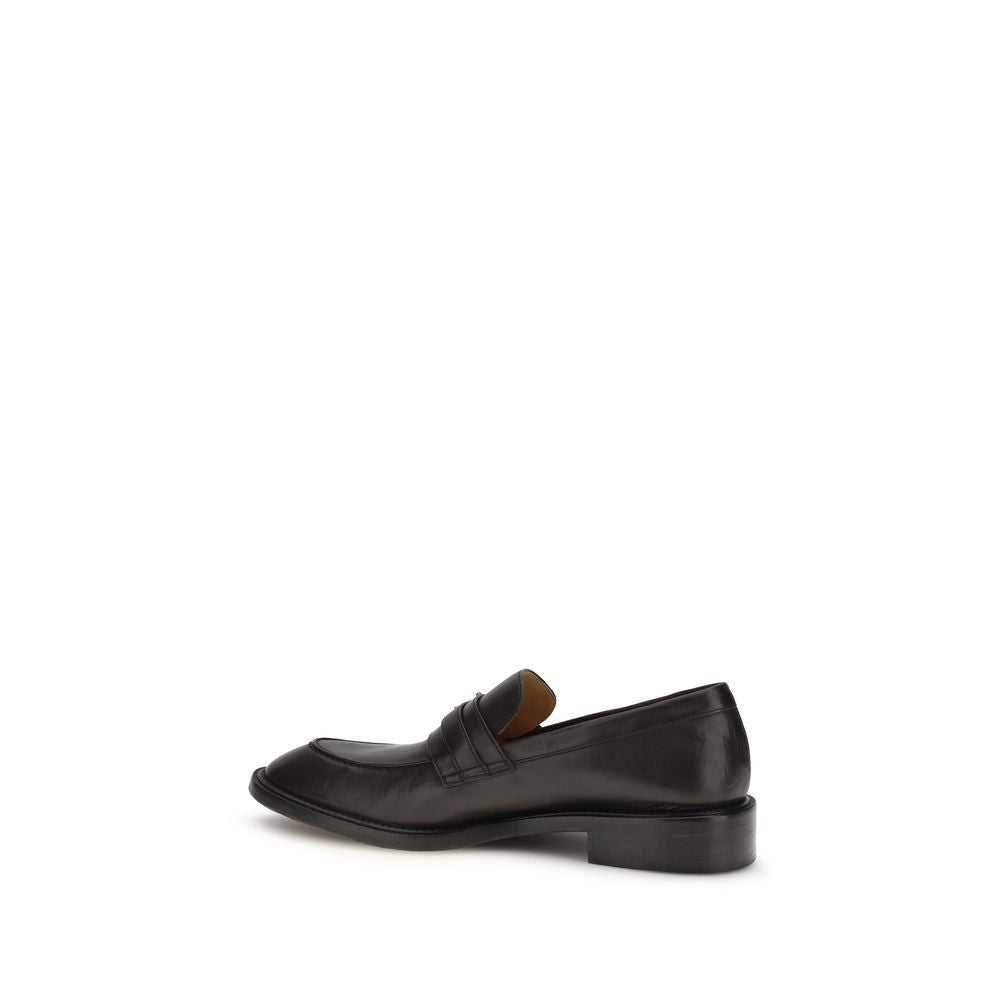 Chaussures mocassins Versace Bos Taurus en cuir de veau noir, slip-on élégants pour homme, finition raffinée et style sophistiqué.