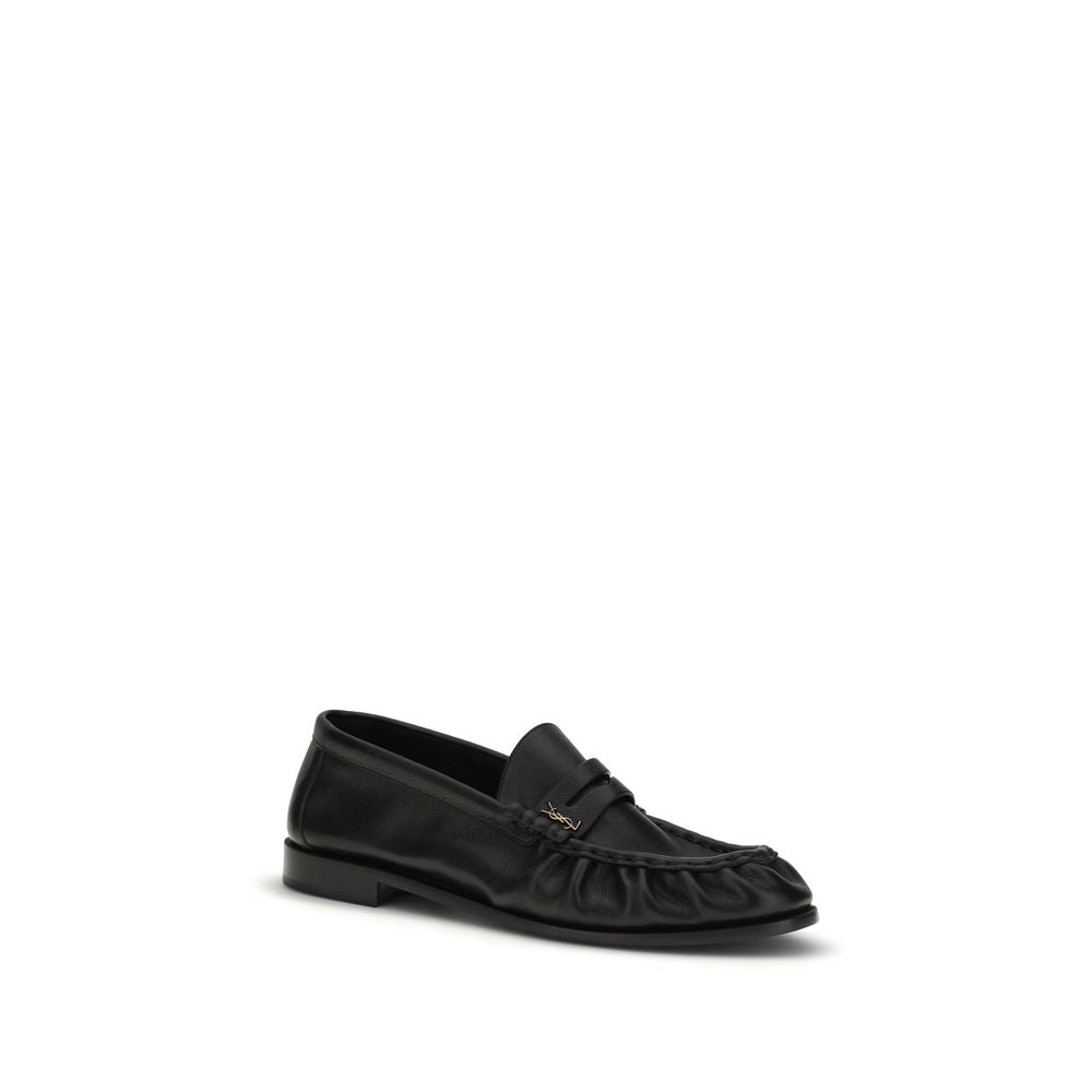 Chaussures slip-on en cuir de veau noir Bos Taurus de Saint Laurent, mocassins élégants pour homme.