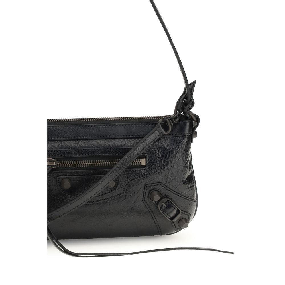 Sac à épaule Balenciaga en cuir d’agneau noir avec détails en ovis, style élégant et moderne.