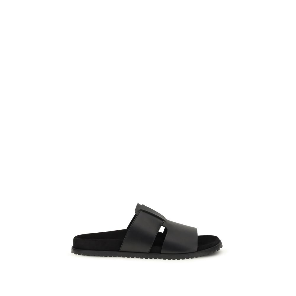 Sandales Bos Taurus en cuir de veau noir de Dolce & Gabbana, chaussures élégantes avec straps et finition sophistiquée.
