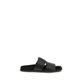 Sandales Bos Taurus en cuir de veau noir de Dolce & Gabbana, chaussures élégantes avec straps et finition sophistiquée.