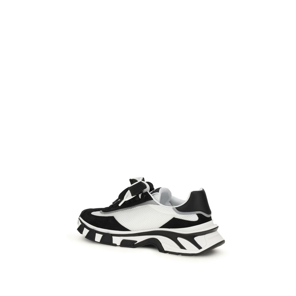 Sneakers athlétiques en cuir de veau noir Bos Taurus de Dolce & Gabbana, style élégant et moderne.