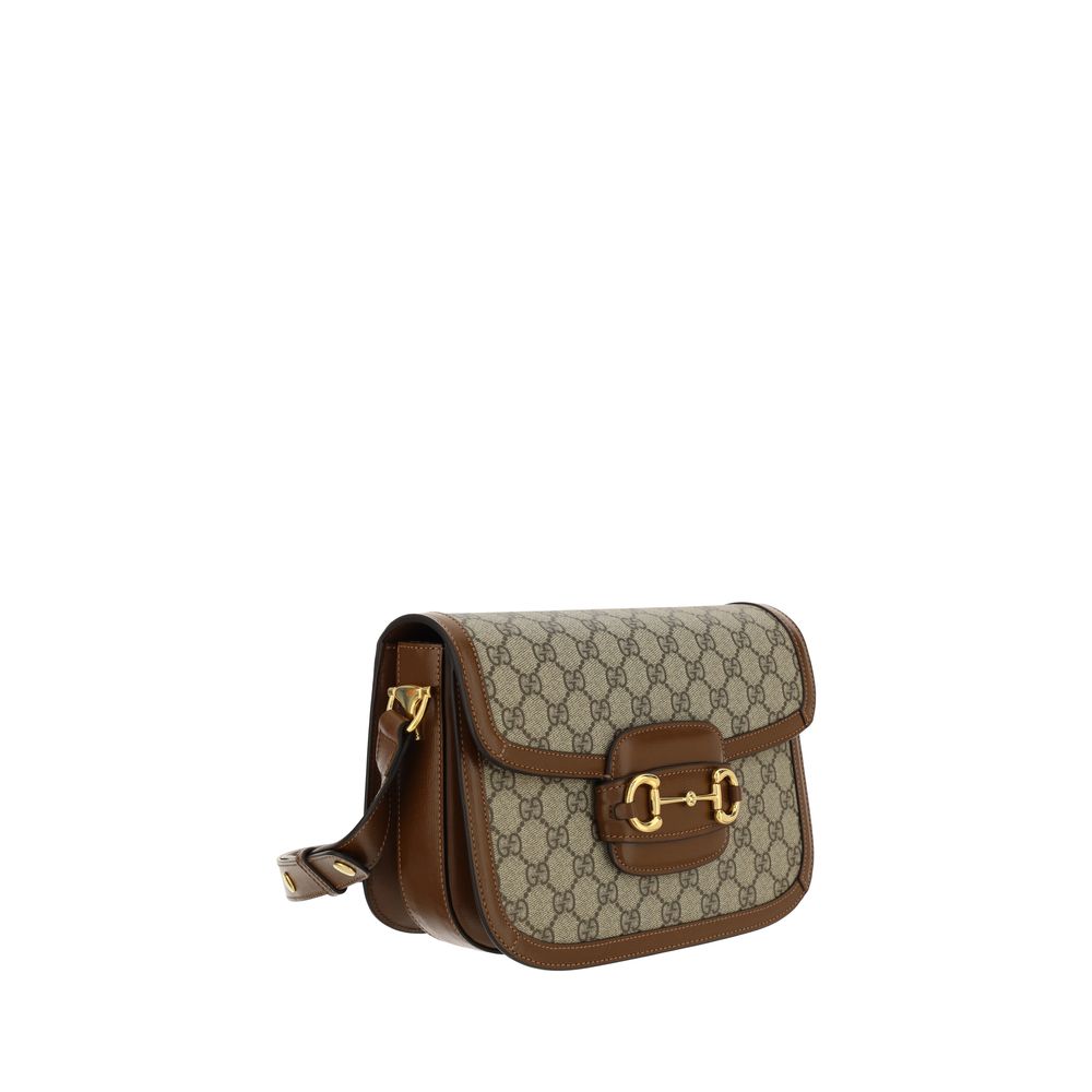 Sac à main Gucci en coton beige, avec détails élégants, idéal pour un style sophistiqué et décontracté.