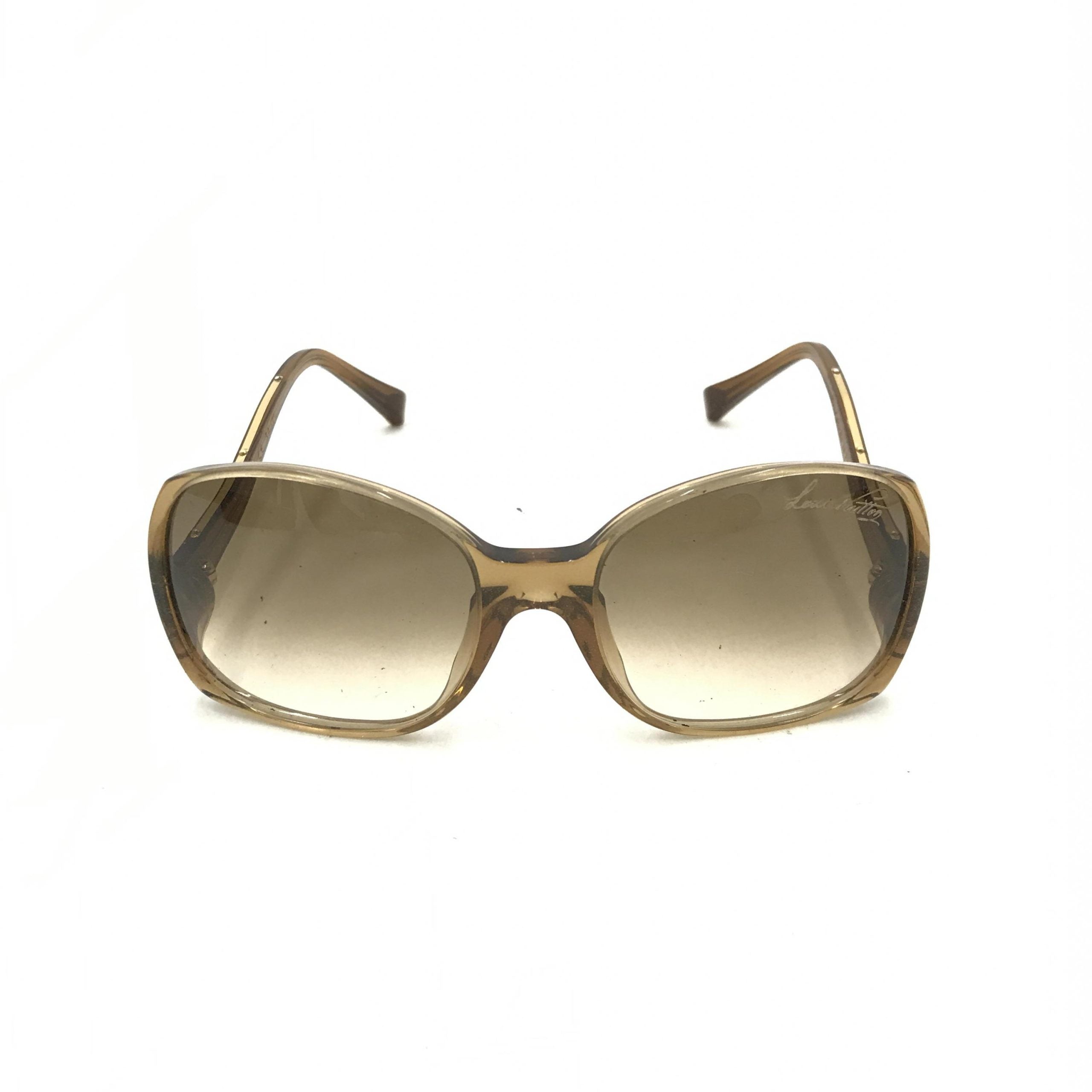 Lunettes de soleil Louis Vuitton avec cadre en acétate marron tacheté, style élégant et sophistiqué, vue de face.