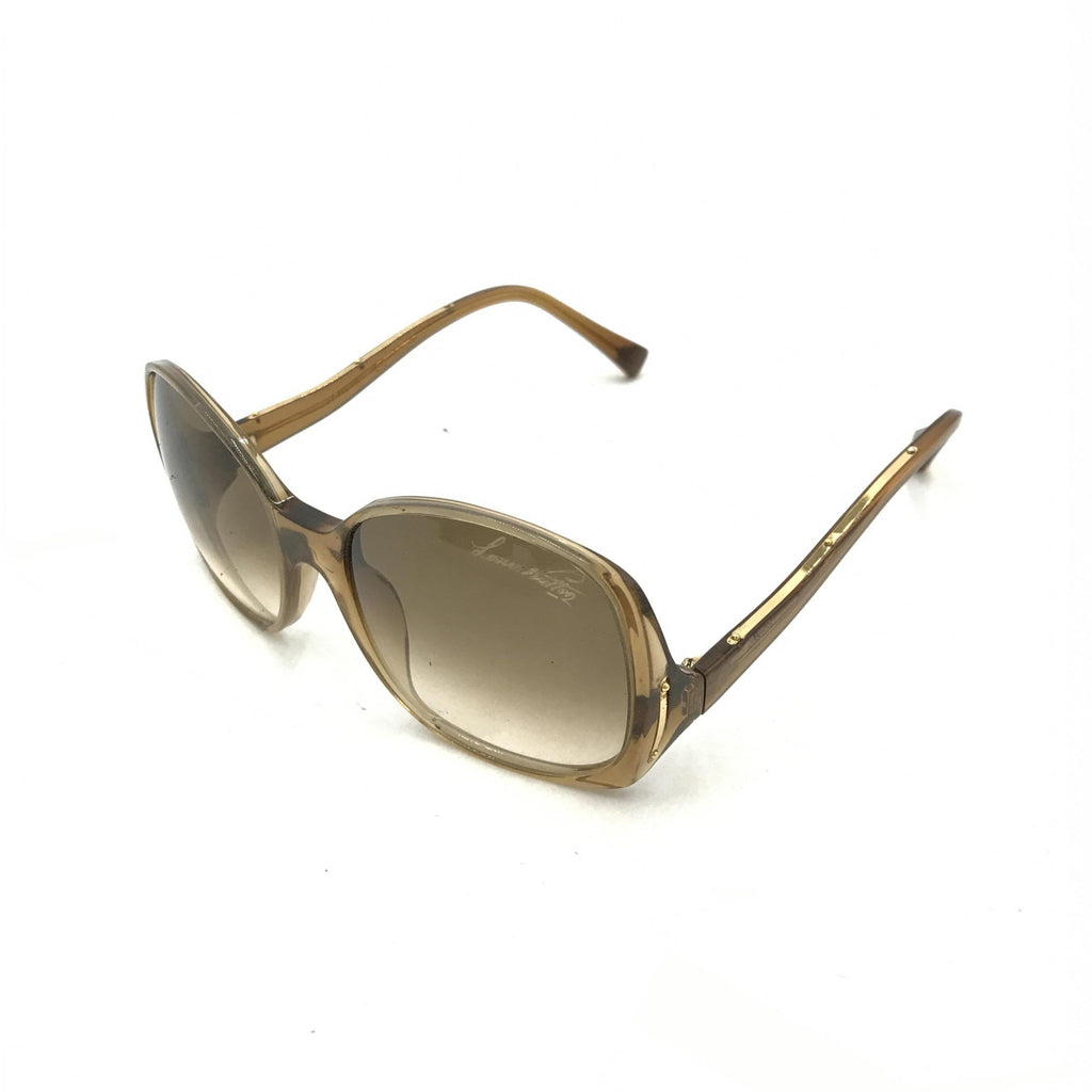 Lunettes de soleil Louis Vuitton à monture en acétate brun avec motifs tachetés, style élégant et sophistiqué.