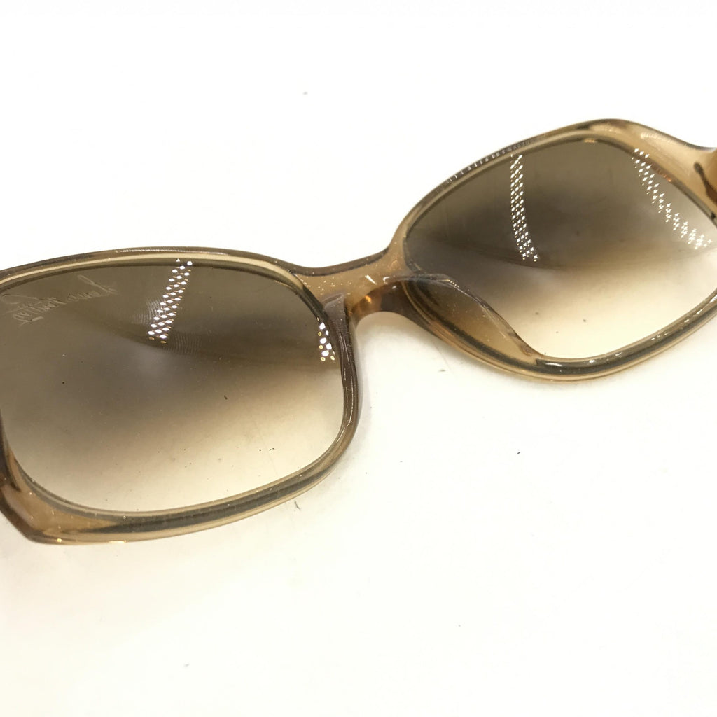 Lunettes de soleil Louis Vuitton en acétate marron à taches, cadre élégant avec verres de protection solaire.