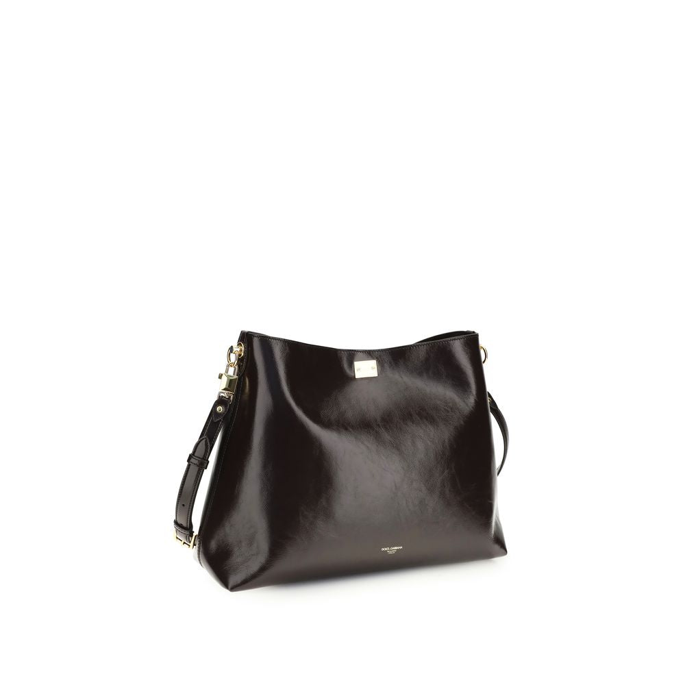 Sac à épaule Dolce & Gabbana Bos Taurus en cuir de veau marron, design élégant et sophistiqué.