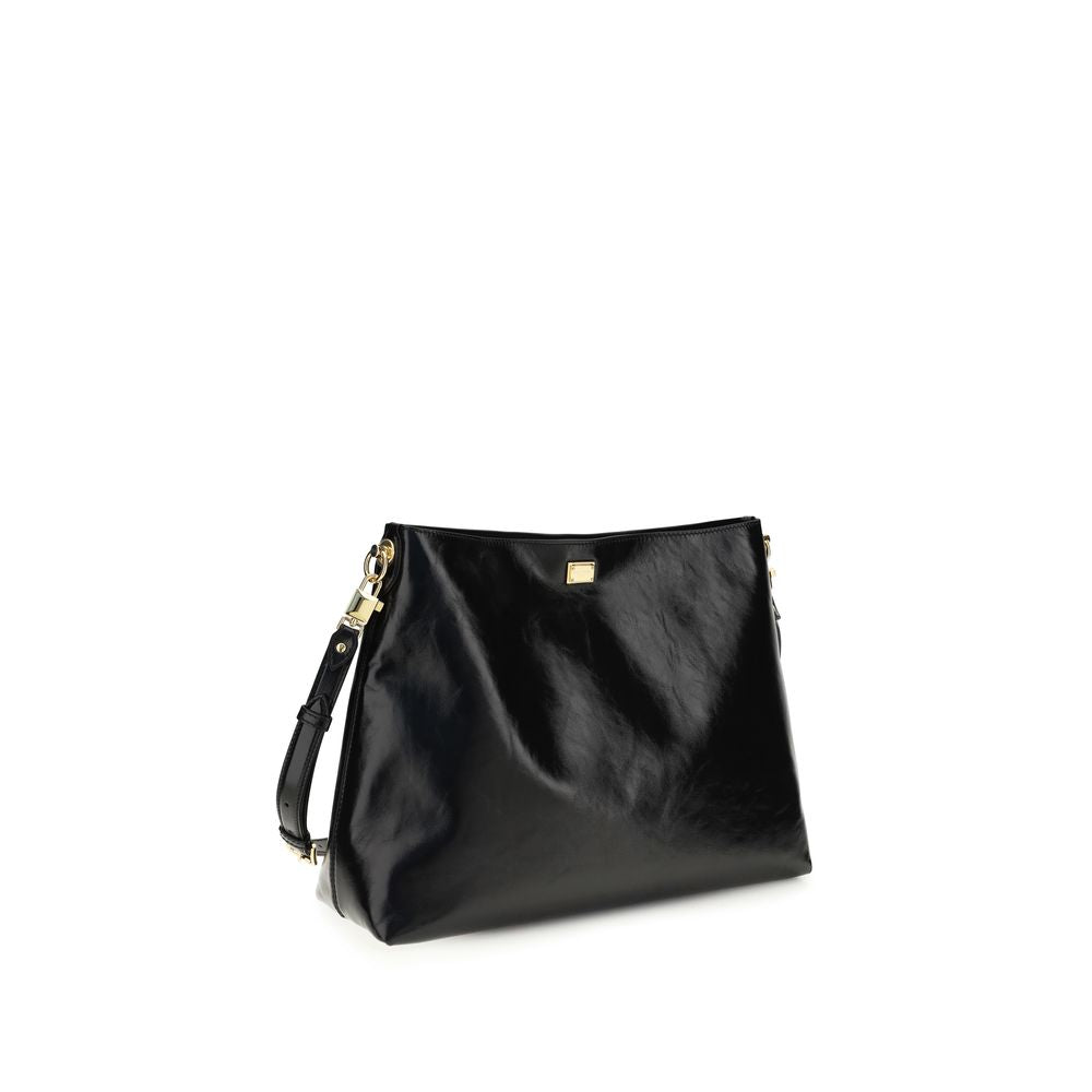 Sac à épaule Dolce & Gabbana Bos Taurus en cuir de veau noir, élégant et sophistiqué, avec détails en métal doré.