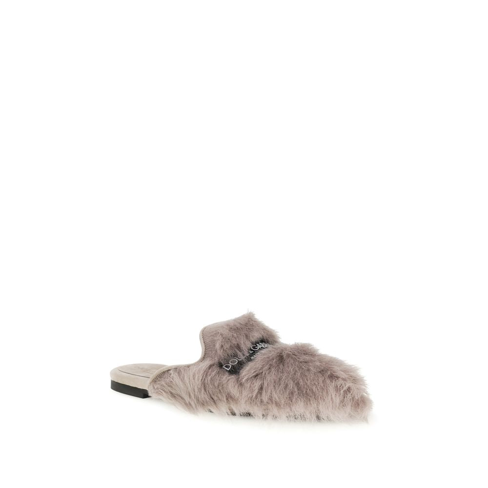 Mules gris en laine d'agneau Dolce & Gabbana, style élégant avec semelle en cuir, vues de côté.
