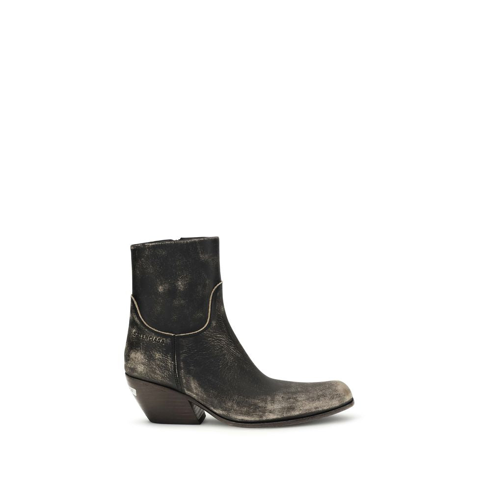 Bottes ankle en cuir de veau noir Balenciaga Bos Taurus, style élégant et moderne, visibles sur l'image.