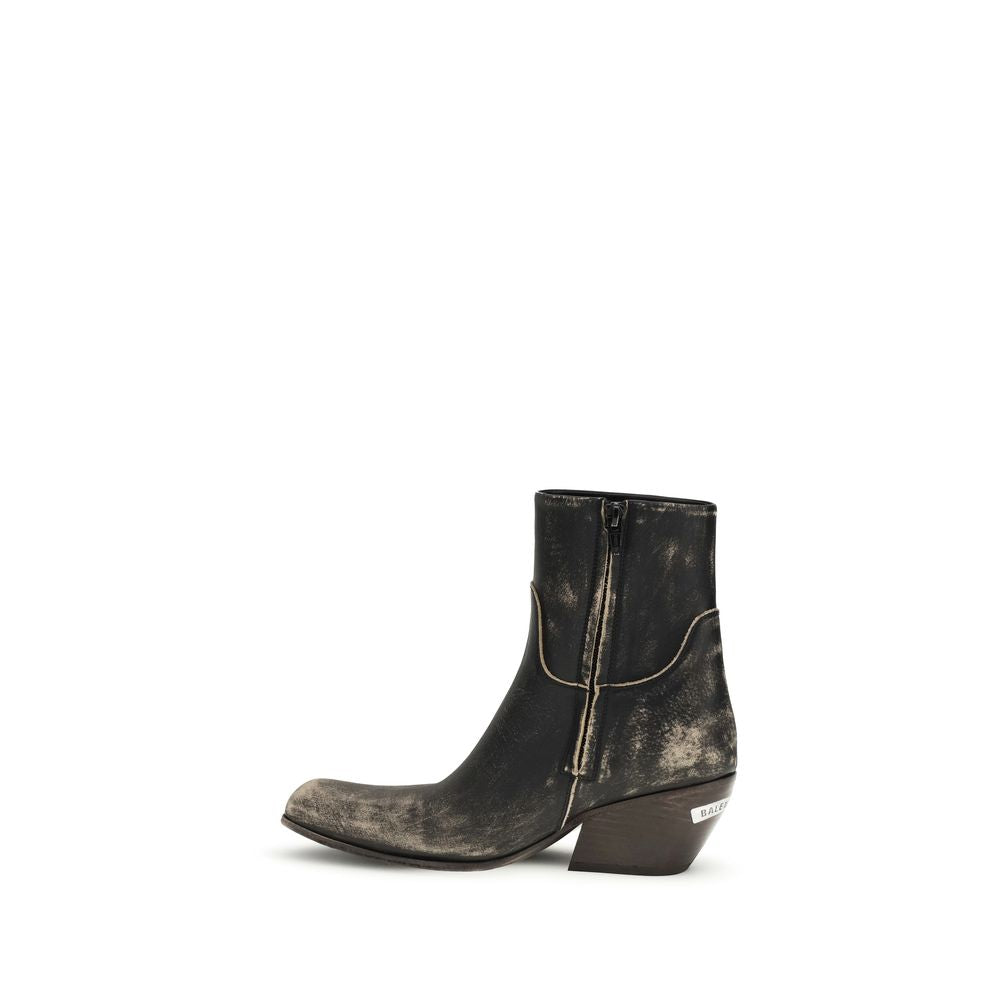 Bottes ankle en cuir de veau noir Balenciaga Bos Taurus, style élégant et moderne, vue de face avec détails de la chaussure.