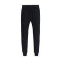 Pantalons de sport en nylon noir Prada pour hommes, coupe décontractée et bande élastique à la taille, vue de face.