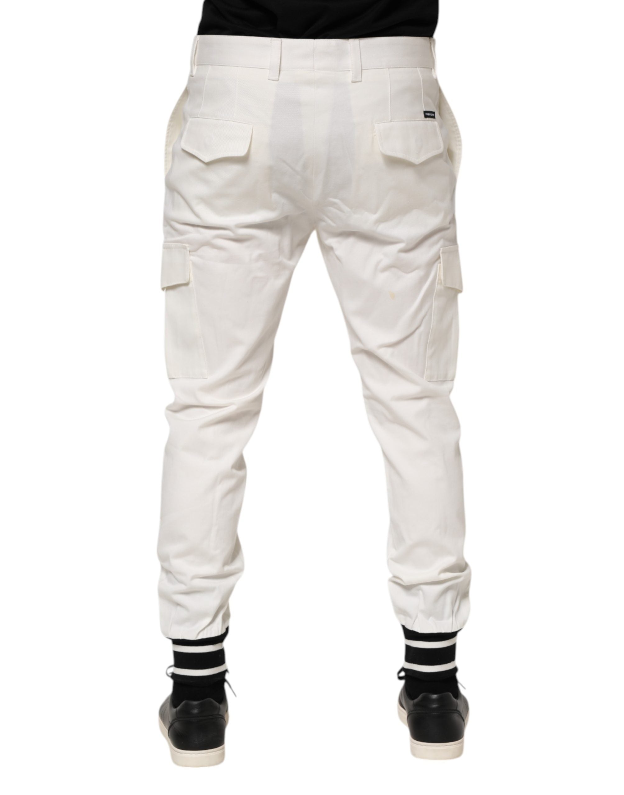 Pantalons homme Dolce & Gabbana en coton blanc, joggers cargo skinny avec poches, look décontracté et moderne.
